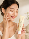 Model applying AXIS-Y TXA 2.5% Intensive Brightening Cream